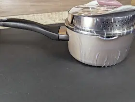 21907 Farberware 1 Quart Covered Straining Saucepan Nonstick