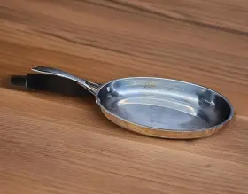 022016 Wolfgang Puck Bistro Elite Collection 12 Inch Oval Skillet Stainless Steel