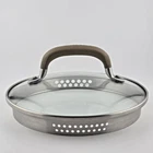 Circulon 7 Inch Glass Pot Lid W/ Stainless Rim & Brown Silicone Grip Handle Used. Price: $9.94.