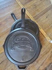 Cabela's Cast Iron Double Spout Skillet 12 W/ Frying Pan Lid Combo Cooker Used. Price: $125.00.