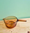Vintage Visions Corning Amber Glass Cookware 2.5 Pot New. Price: $64.99.