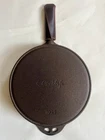 Cooklife 10.25 Inch Smooth Pre-seasoned Cast Iron Skillet, With Handle Cover. Used. Price: $45.00.