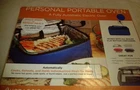 Hot Logic Mini Blue Portable Oven Food Warmer - 12V Vehicle Plug New Open Box. Price: $30.00.