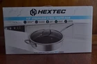 Hextec 9.5 Inch 3 Ply Hybrid Stainless Steel Saute Pan W/ Tempered Glass Lid New. Price: $52.80.