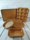 New 5PC Gotham Steel Bakeware Set / Muffin Pan, Cookie Sheet, Bread Round. Price: $46.99.