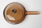 Corning France Visions Amber 7 3/8" Skillet With Lid V1.5C Used. Price: $30.00.