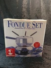 Roshco Foundue Set Stainless Steel Pot 6 Forks New Box. Price: $15.00.