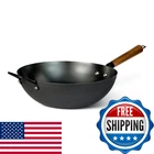 Amazon Basics 12.6" Carbon Steel Pre-seasoned Wok All Cooktops New. Price: $45.17.