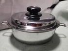 Saladmaster HS-316TI Titanium Stainless Steel 8.6" Skillet W/o Handles, Vapo Lid Used. Price: $197.00.