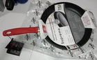 Olympia Love Die Cast Aluminum Nonstick Frying Pan, 11 New. Price: $49.95.