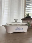 Blue Daisy Sears 1970 Corningware Browning Dish With Glass Lid 8467310 Ceramic Used. Price: $15.00.