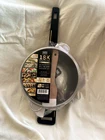 Iko 18K Signature Series 3.5 Quart Saut Pan W/lid, Steam Basket And Spatula New. Price: $16.00.