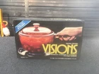 Visions Qt 1.5 L V-1 1/2-N Amber Covered Saucepan Unopened Nos New. Price: $98.00.