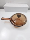 Corning Ware Vision Amber Sauce Pan Skillet 0.5L With Lid Used. Price: $13.99.