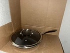 Hexclad Hybrid Nonstick 10-INCH Frying Pan With Tempered Glass Lid Used. Price: $99.99.
