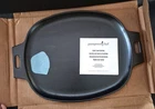 Brand New Sealed Pampered Chef 10" X 16" Cast Iron Sizzle Skillet- Item #100369. Price: $39.99.