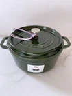 New In Box Staub Cast Iron 4-QT Round Cocotte, Basil. Price: $289.00.