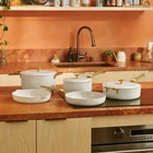 Our Place 8-PIECE Essentials Healthy Ceramic Nonstick Cookware Set Cream New. Price: $124.99.