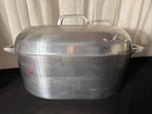 Farberware 8 Qt Roaster Cast Aluminum Dutch Oven With Lid Used. Price: $85.00.