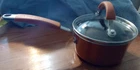 Rachael Ray Non-stick 1 Qt Saucepan Cookware W/glass Lid & Insulated Handles Used. Price: $12.99.