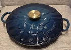 Creuset Enameled Cast Iron Petal Braiser New. Price: $259.95.