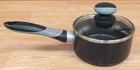 Genuine Mirro Black Non Stick 1 Quart Sauce Pan With Glass Lid & Rubber Grip Used. Price: $40.08.