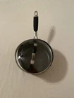 Calphalon 7 Hard-anodized 2 Qt. Sauce Pan With Tempered Glass Lid Used. Price: $15.00.