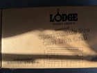 Lodge Cast Iron Sportsmans Black Charcoal Grill-lsprog New. Price: $100.00.