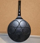Cainfy 10.5" Nonstick Pancake 7 Mold Griddle, Induction Compatible Used. Price: $24.95.
