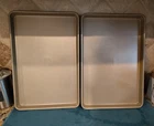 Set Of 2 Dash That 10X15 Inch Gold Nonstick Baking Sheets Cookie Pans Used. Price: $12.00.