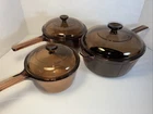 Set 3 Vtg Visions Corningware Pyrex Amber Glass Cookware Pots Lids 6 Usa Used. Price: $99.88.