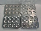 X4 Fox Run Stainless Steel Muffin & Cupcake Pans (12) 2"W Trays 9.5"X7.5" Used. Price: $40.00.