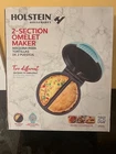 Brand New Holstein Housewares 2 Section Omelet Maker Stainless Steel Upper. Price: $25.99.