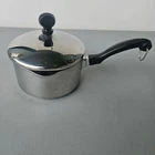 Farberware Stainless Steel 1QT Saucepan With Strainer Lid And Double Pour Spouts Used. Price: $16.00.