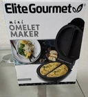 Elite Gourmet EOM123 Mini Omelette Maker, Black, 360W Nonstick Portable New. Price: $24.99.