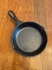Lodge H3SK 6.5 Inch Heat Treated Cast Iron Skillet Used. Price: $14.99.