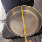 Pampered Chef 12" Stainless Steel Skillet With Lid. Used. Price: $45.00.