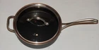 New Calphalon Model 5003 Quart Sauce Pan With Glass Lid. Price: $69.99.
