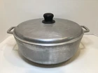 Vintage Imusa 12 Aluminum Pot With Lid - Caldero Colombia Used. Price: $24.99.