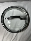 Calphalon Glass Strainer Lid Only Replacement 0514115 Inside 1/2" Outside 6" Used. Price: $17.99.