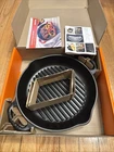 Brand New Le Creuset Signature Cast Iron 9.75 Inch Round Deep Grill Pan. Price: $165.00.