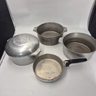Vintage Wagner Ware Magnalite Dutch Oven 4248-P Aluminum Lot Of Pots Used. Price: $84.99.