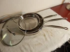 3 Cuisinart Stainless Steel Pans 10 & 8 Fry Saute W/lid Used. Price: $80.00.