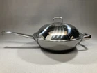 Wmf Stainless Steel Multiply Wok Adjustable Vented Lid 11 1/2" Used. Price: $99.00.
