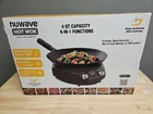 Nuwave Induction Hot With 14" Carbon Steel Wok, Glass Lid & Stand New. Price: $99.95.