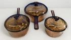Set 3 Vtg Visions Corningware Pyrex Amber Glass Cookware Pots. Lids Usa Used. Price: $105.00.