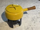 Vintage Dansk Yellow Enamel Kobenstyle Fondue W/ Cast Iron Stand Warmer Used. Price: $69.99.