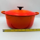 Creuset Vintage Flame Orange Enameled Cast Iron Round Dutch Oven Size Used. Price: $100.00.