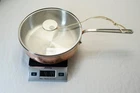 New Mauviel 1830 Copper 10" Stainless Steel Saucepan W/ Glass Lid. Price: $249.00.