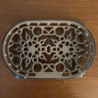 Le Creuset Flint Oyster Oval Trivet Cast Iron Used. Price: $99.99.